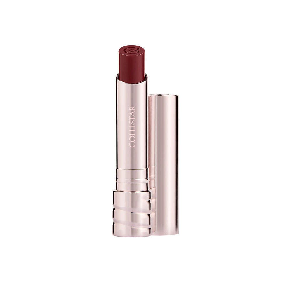 Lipstick, geopend. Metalen huls, donkerrode lipstick. Witte achtergrond.