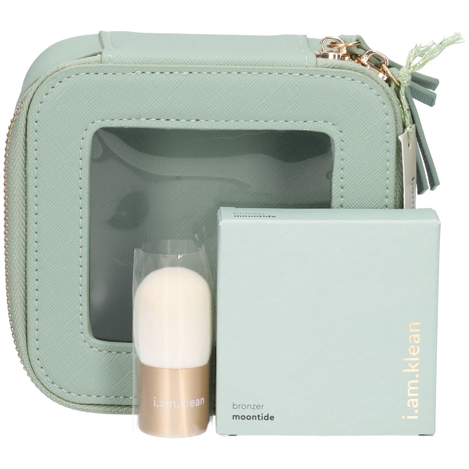 Trousse de maquillage verte avec pinceau et poudre. Boîte de poudre avec inscription bronzer moontide. Label : i.am.klean.
