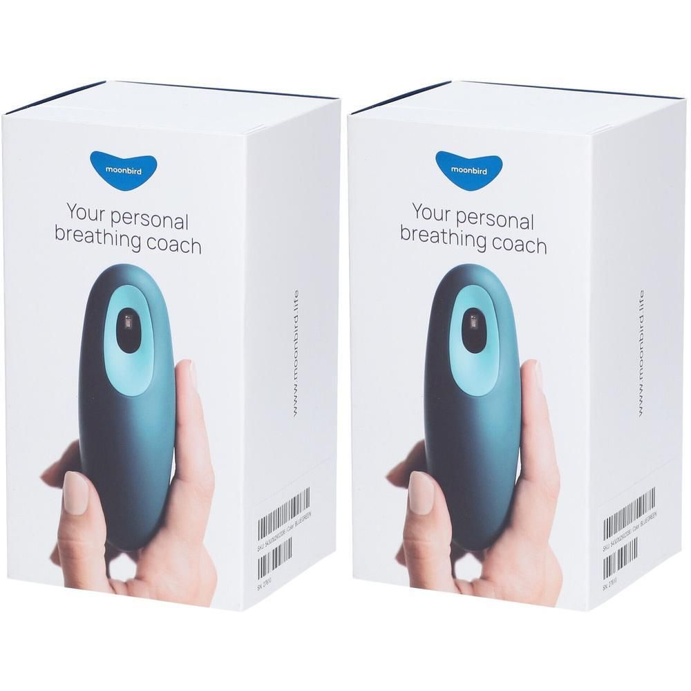 Deux boîtes Moonbird. Chaque boîte présente un appareil bleu-vert dans une main. Texte: Your personal breathing coach.