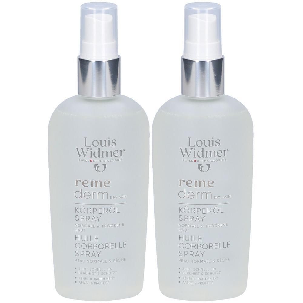 Twee sprays Louis Widmer Remederm. Transparante flessen met zilveren sproeikoppen. Opschrift: Remederm, Body Oil Spray.