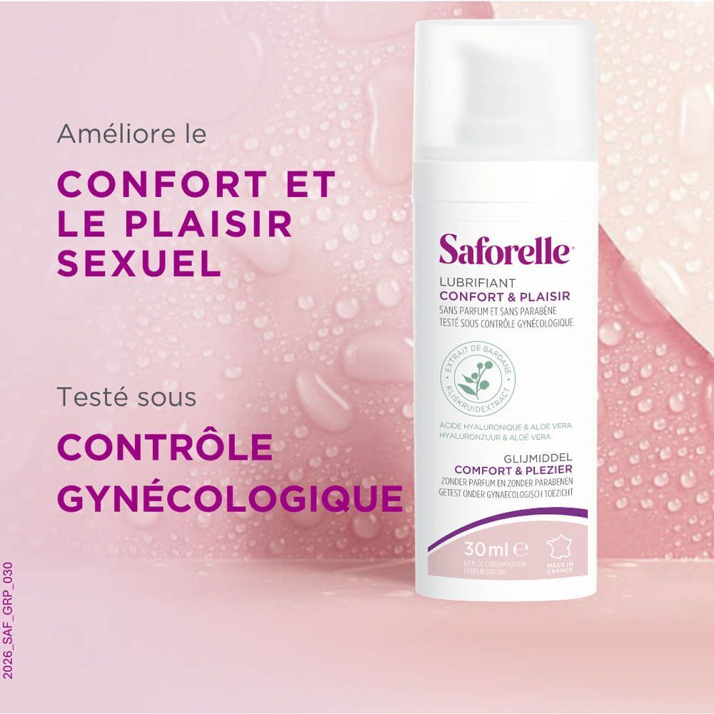 Flacon de Saforelle Lubrifiant avec distributeur, 30ml, sur fond rose.