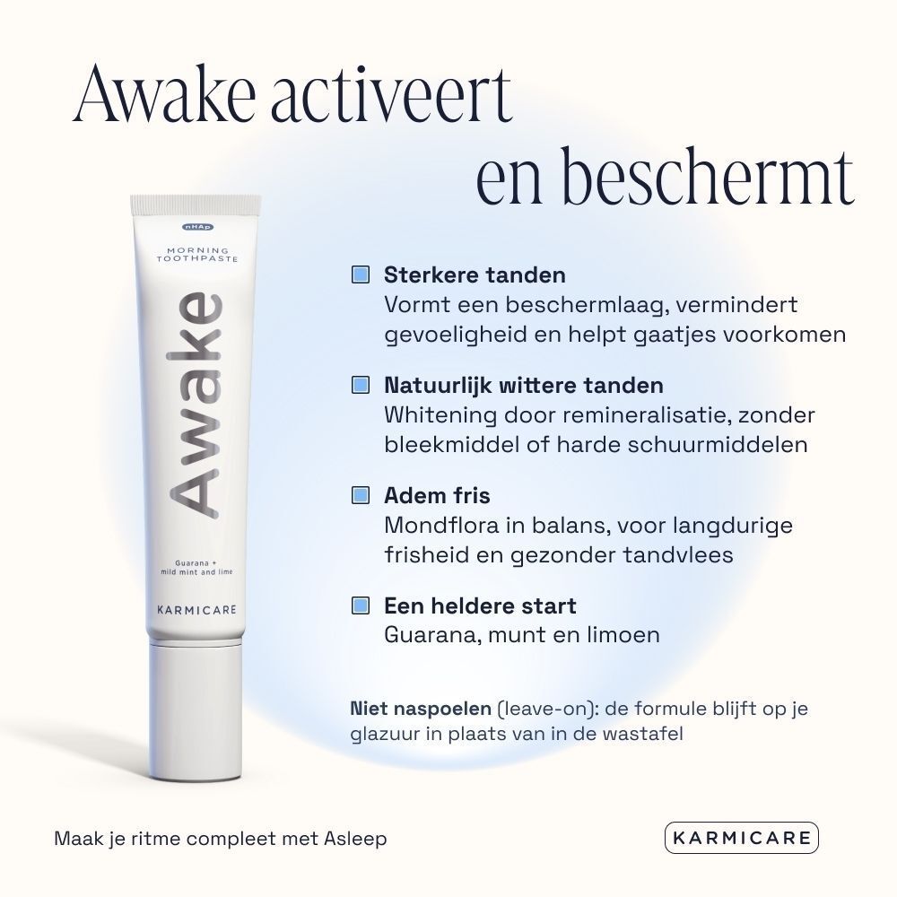 Een witte tube met de tekst 'Awake' en 'Morning Toothpaste'.