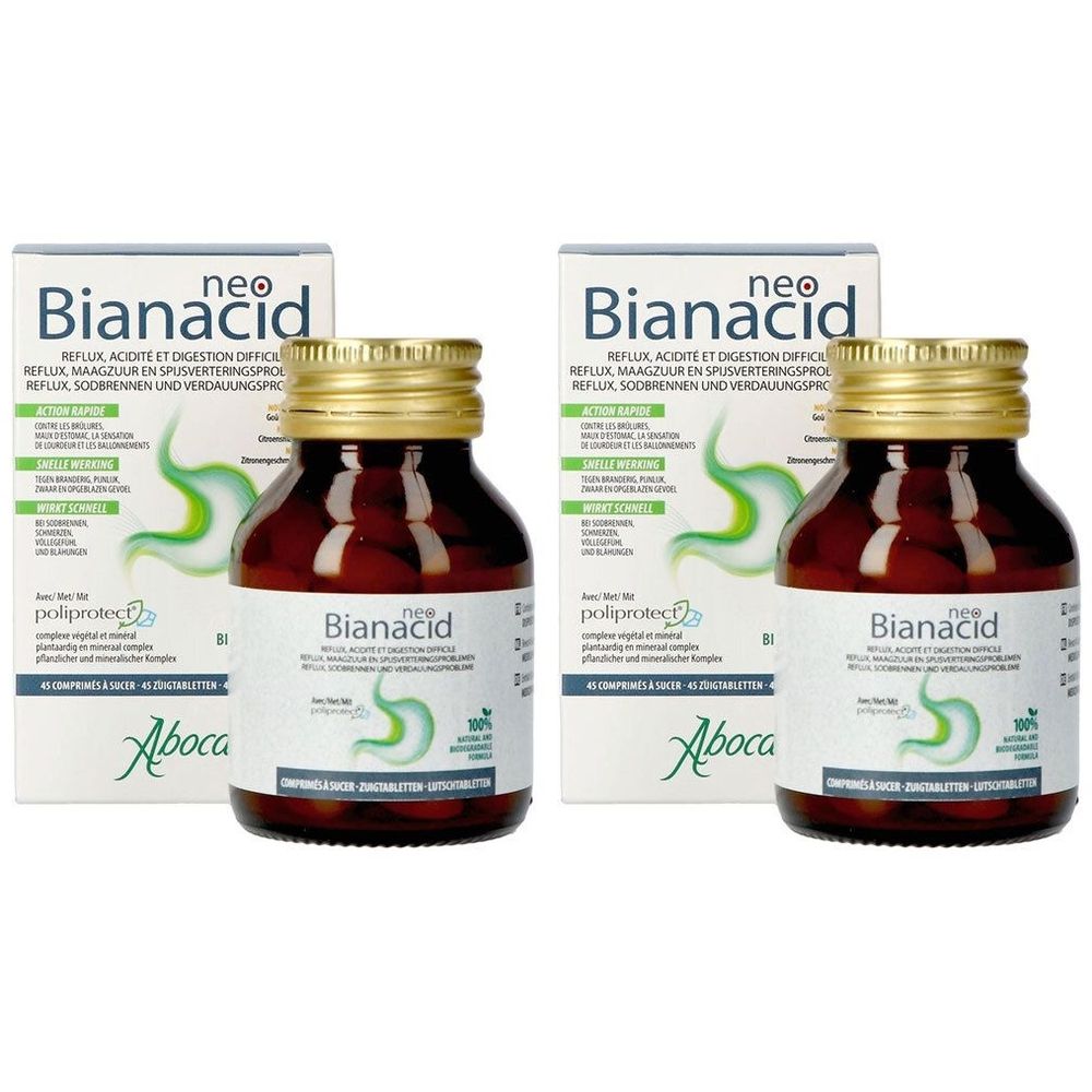 Twee flessen en twee dozen NeoBianacid. Bruine glazen flessen met gouden doppen. Witte dozen met groene accenten.