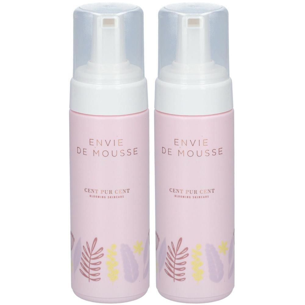 Twee roze flacons met witte pomp. Opschrift: Envie de Mousse, Cent Pur Cent. Decoratieve bladeren.