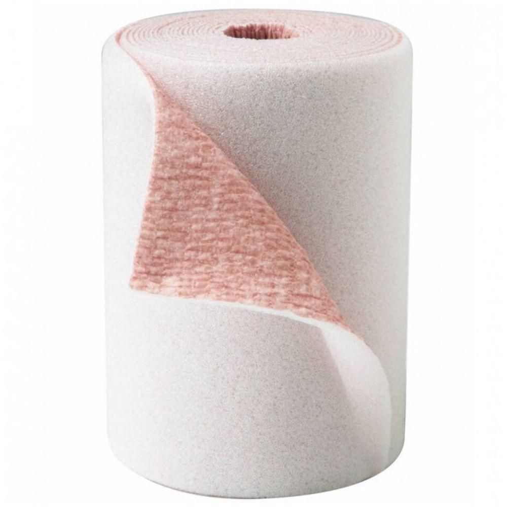 Rol wit verband met roze binnenkant. Gedeeltelijk afgerold, toont de textuur. Cilindrische vorm.