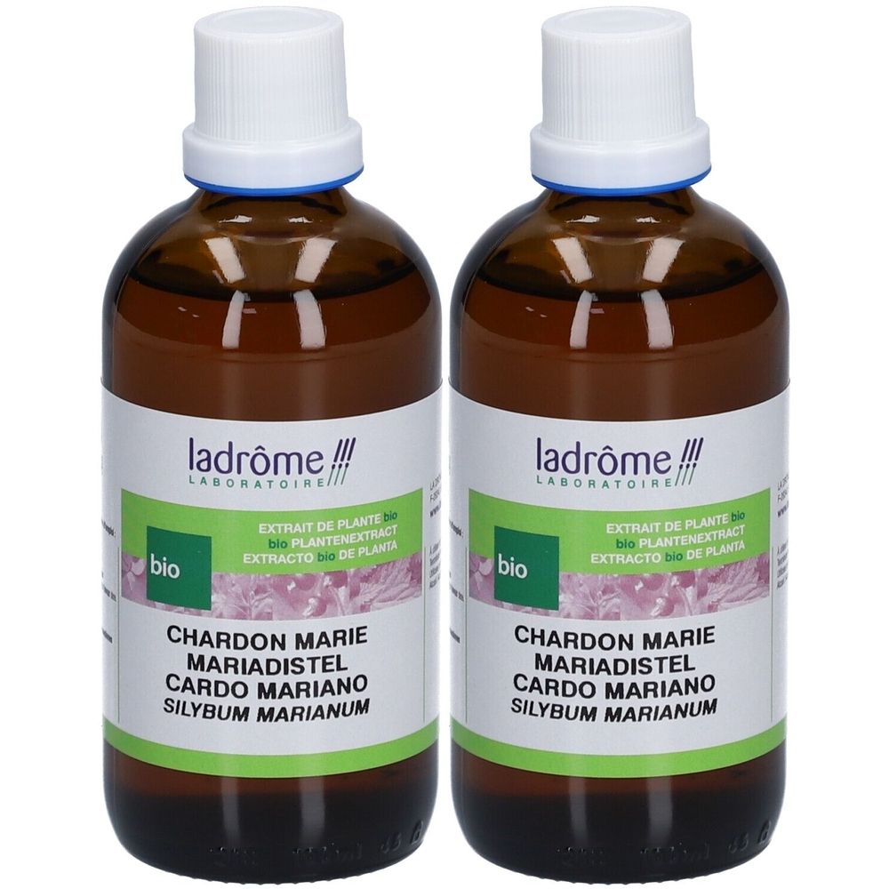 Twee bruine flessen met witte dop en etiket. Opschrift: Chardon Marie, Mariadistel, Cardo Mariano. Bio-certificering.