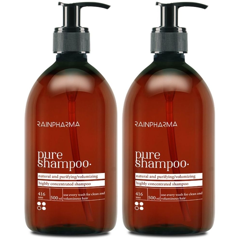 Twee bruine flessen met zwarte pomp. Opschrift: Rainpharma pure shampoo.
