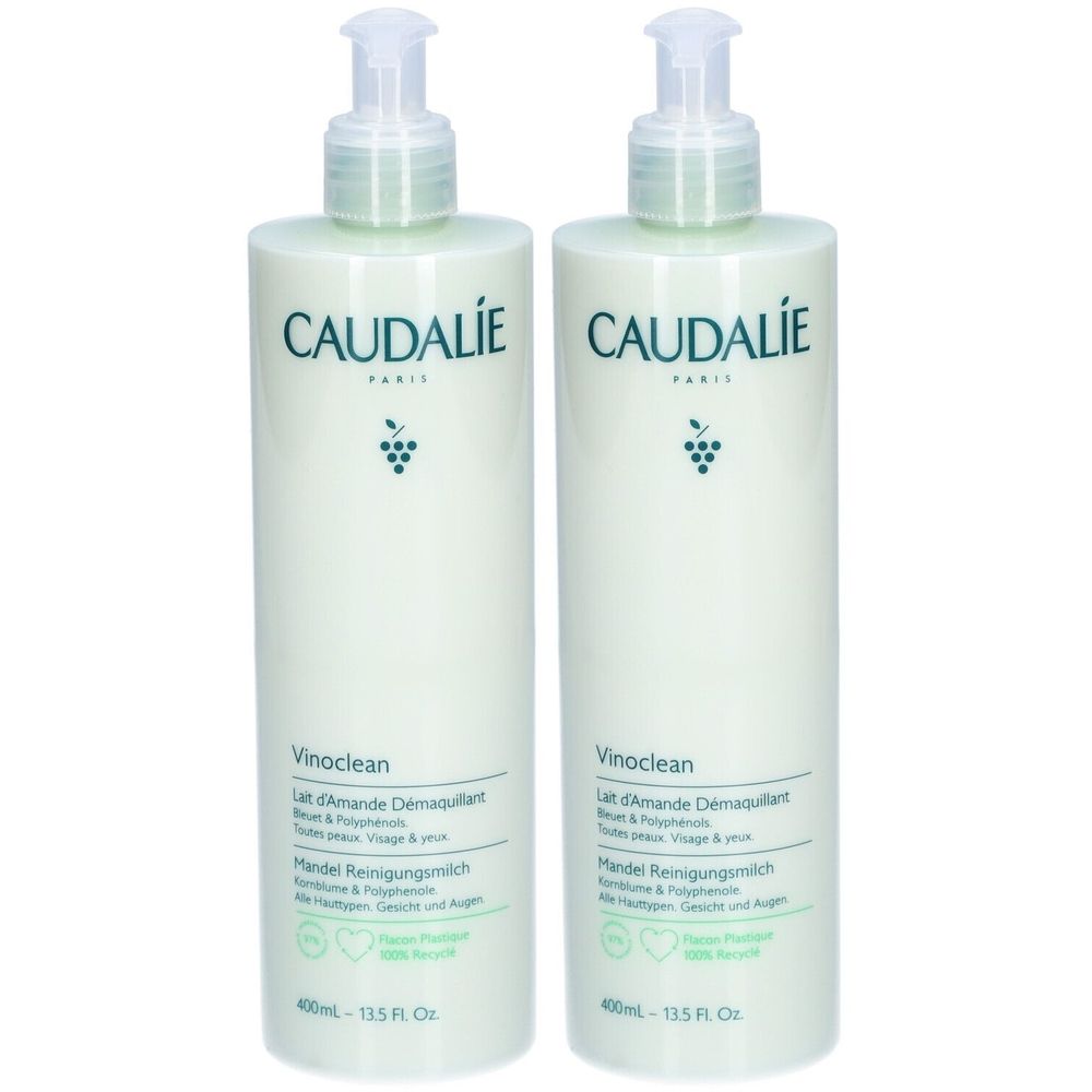 Twee flessen Caudalie Vinoclean Lait d'Amande Démaquillant. Witte flessen met groene tekst en pomp. Meertalige tekst.