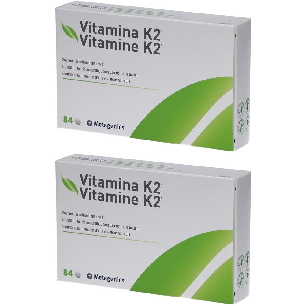 Deux boîtes blanches avec 'Vitamina K2'. Marque Metagenics. Contient 84 comprimés.