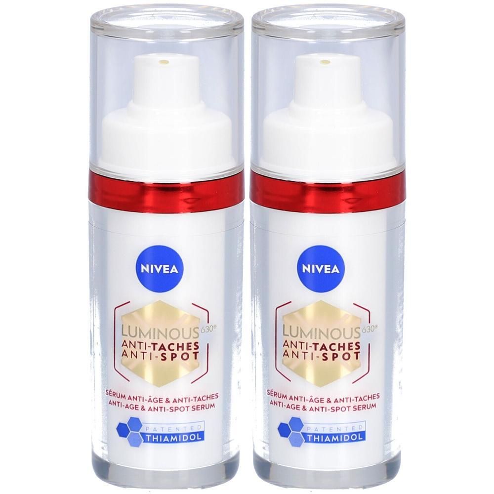 Twee serumflacons met witte pomp, rode ring en transparante dop. Tekst: NIVEA, Luminous Anti-Taches Anti-Spot.