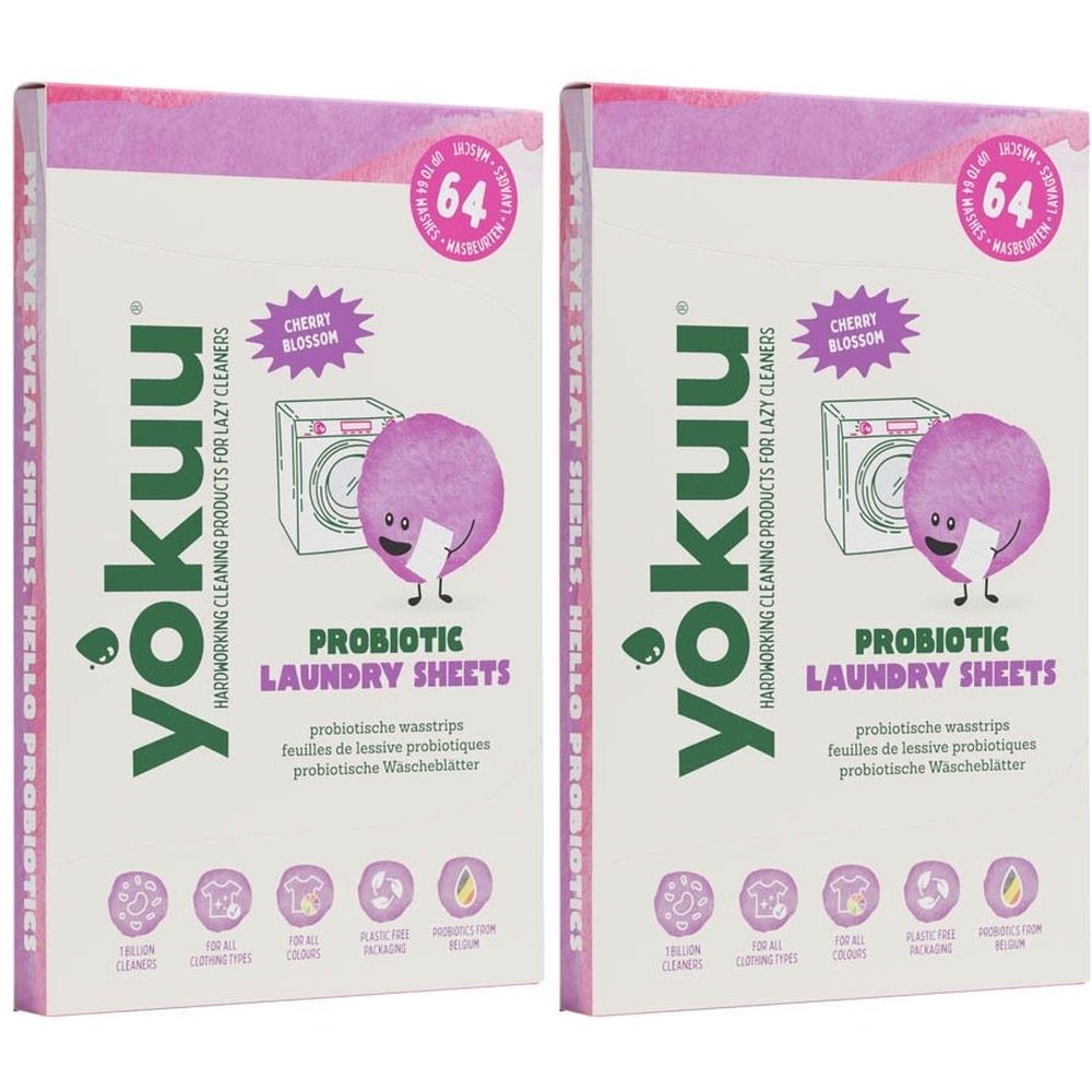 Twee rechthoekige dozen met YOKUU-logo en 'PROBIOTIC LAUNDRY SHEETS'. Kersenbloesemmotief en '64' op de verpakking.