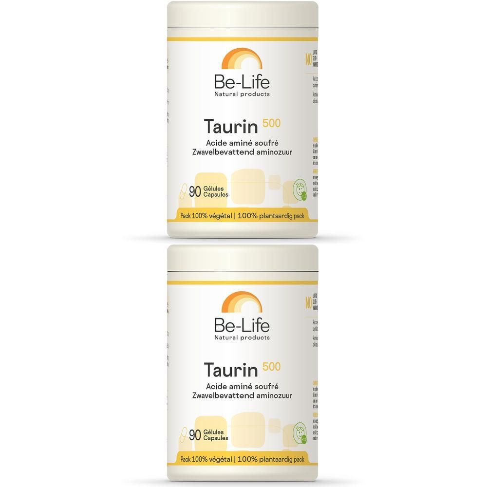 Twee Be-Life Taurin 500 containers. Opschrift: Taurin 500, 90 capsules, 100% plantaardig. Gele en oranje elementen.