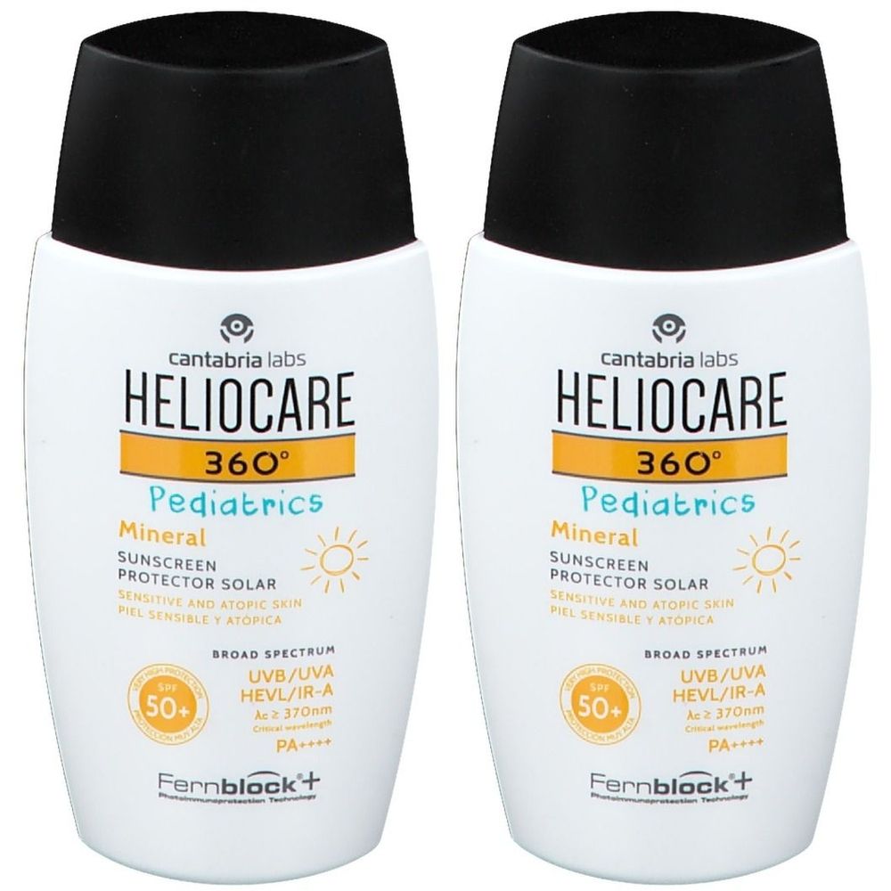 Twee witte flacons met zwarte dop. Opschrift: Heliocare 360° Pediatrics Mineral SPF50+. Zonnecrème voor kinderen.