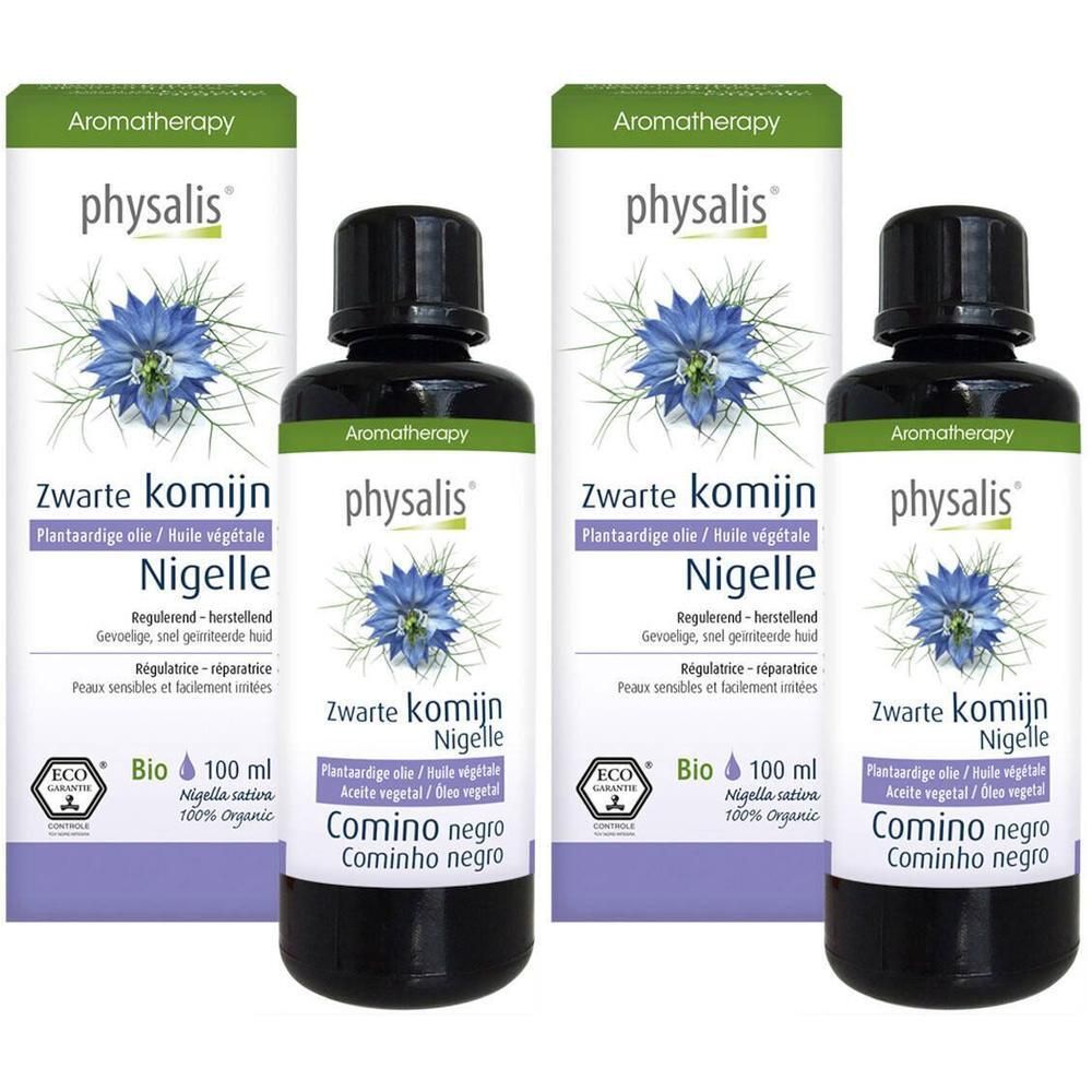 Vier flessen Physalis Nigelle olie. Zwarte glazen flessen met etiket en groene dop. Bio-certificering.
