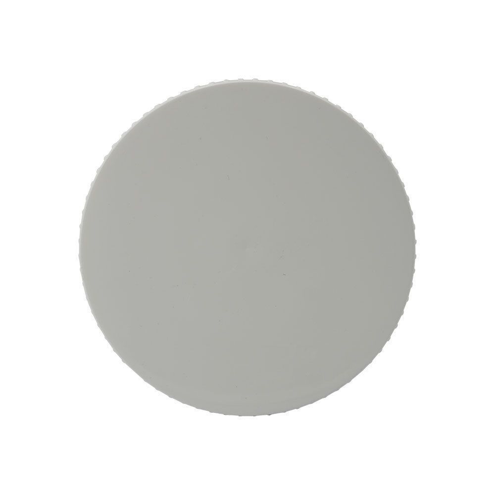 Bovenaanzicht van een witte pot met geribbelde deksel.