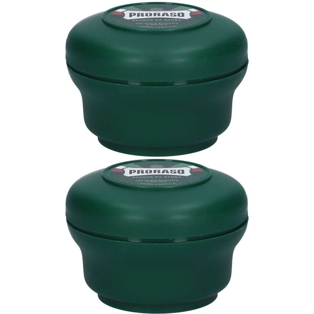 Deux pots de savon à raser verts avec couvercles. Le mot "Proraso" est visible sur le couvercle.