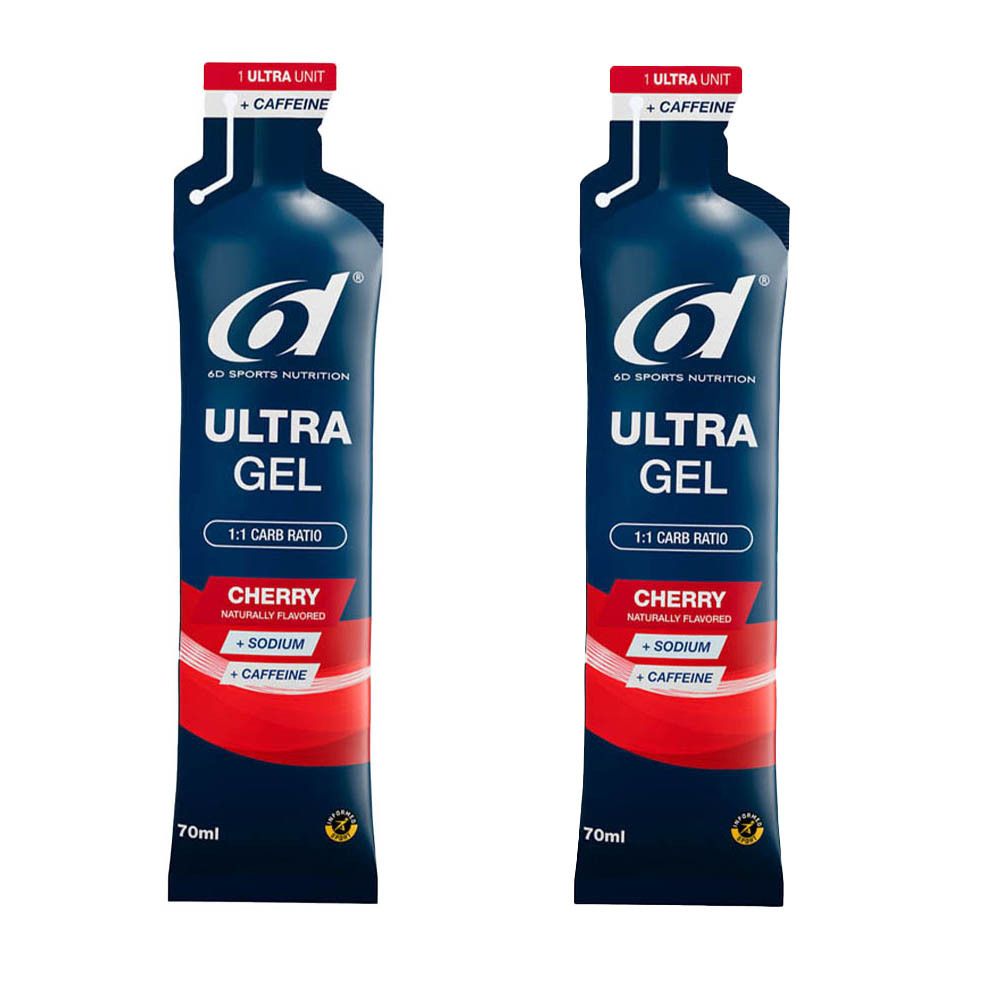 Twee zakjes 6d Ultra Gel. Blauwe verpakking met rode streep. Opschrift: Ultra Gel, Cherry, 1:1 Carb Ratio, 70ml. Bevat cafeïne en natrium.