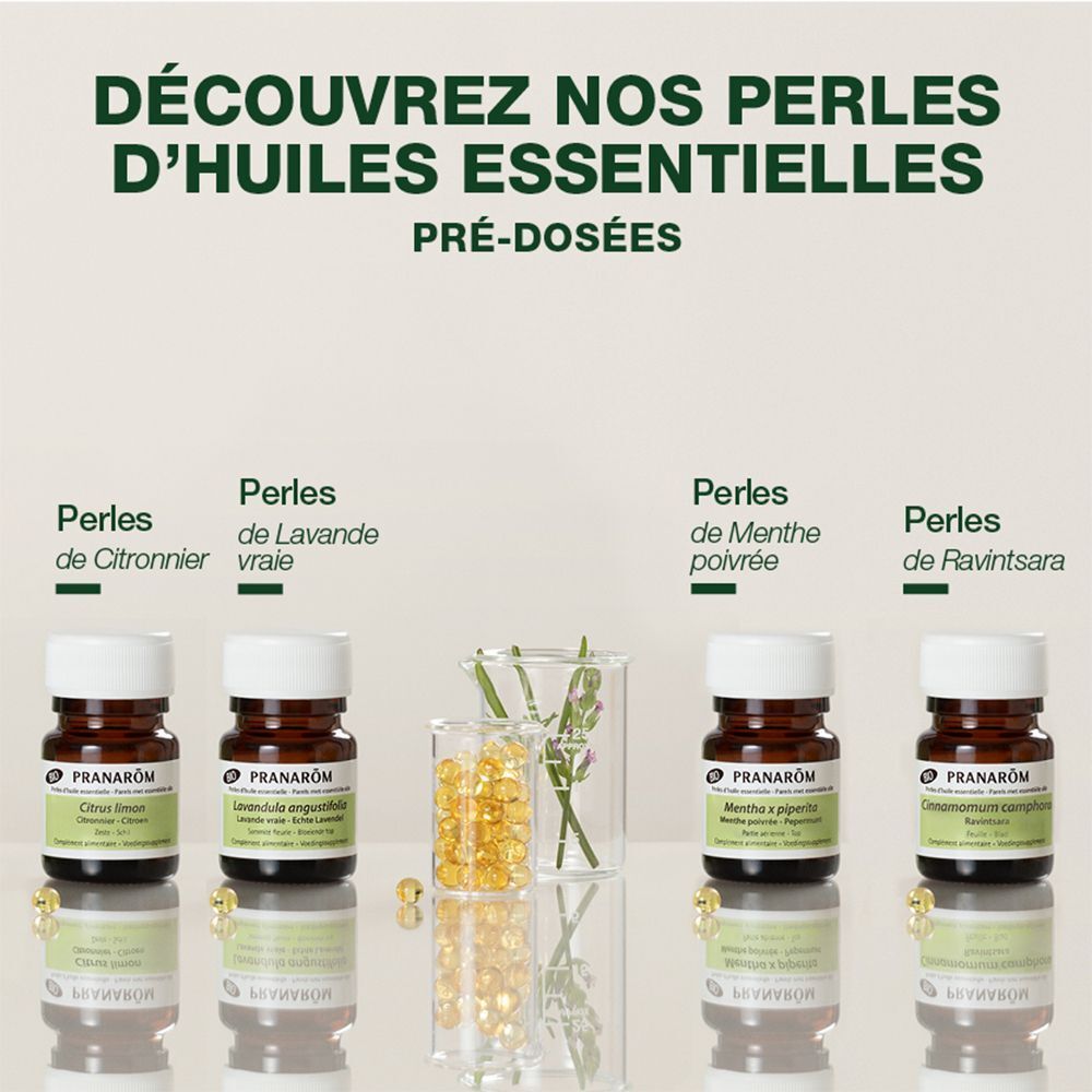 Verschillende flessen met witte doppen. Tekst: "PRANAROM". Parels de Lavande, Menthe poivrée, Ravintsara.
