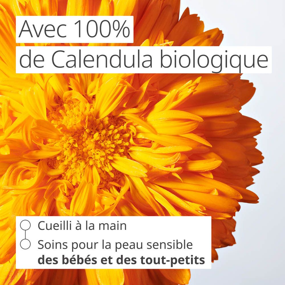 Gros plan d'une fleur de calendula bio. Texte : Avec 100% de Calendula biologique, cueilli à la main.