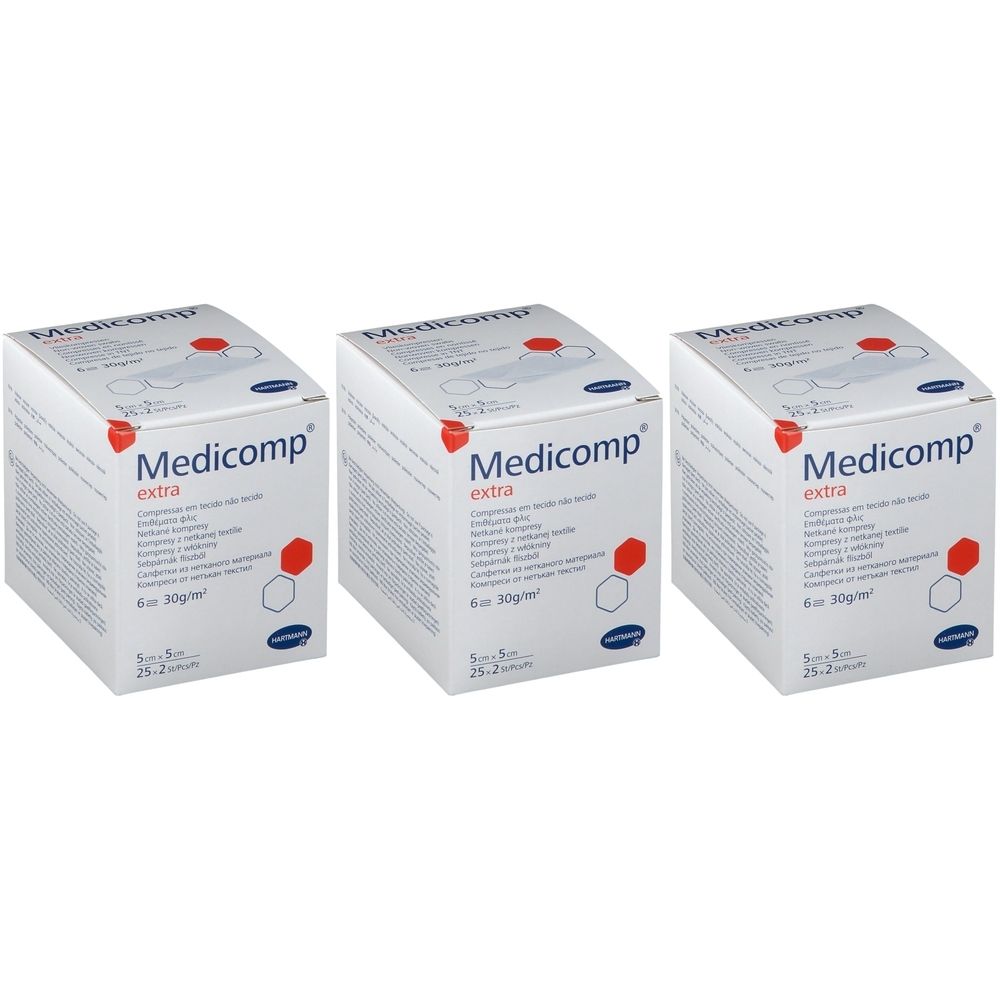 Trois boîtes de Medicomp extra. Boîtes blanches avec texte rouge et bleu. Logo Hartmann en bas à droite.