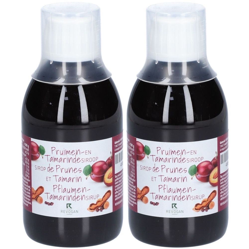 Deux flacons de sirop. Étiquettes avec nom du produit, illustrations de prunes et tamarin. Marque Revogan. Bouchons blancs.