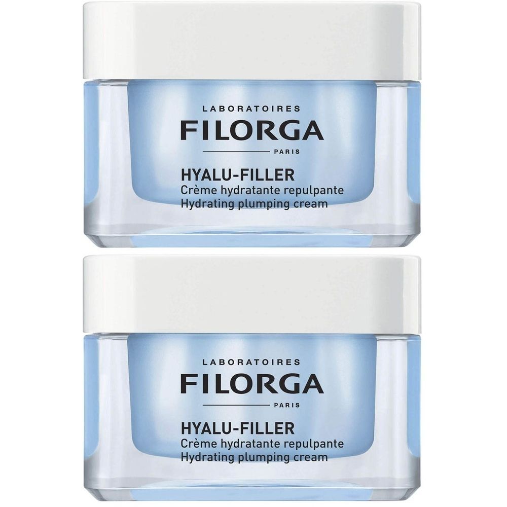 Twee potjes FILORGA Hyalu-Filler crème. Witte deksels, transparante potjes met blauwe inhoud. Opschrift: HYALU-FILLER, Crème hydratante repulpante.