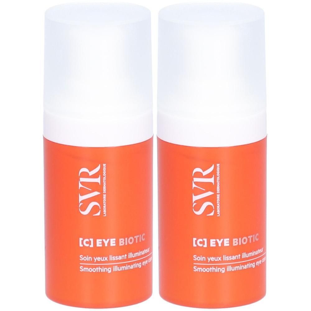Deux flacons orange avec bouchons blancs. Inscription: [C] EYE BIOTIC, SVR. Texte: Soin yeux lissant illuminateur, Smoothing illuminating eye care.