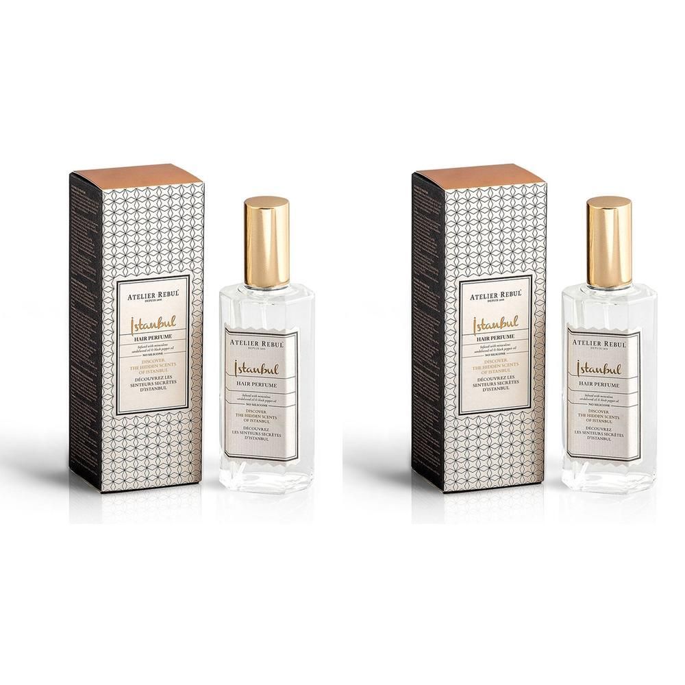 Twee flessen met gouden doppen en dozen, met 'Atelier Rebul Istanbul Room Perfume'.