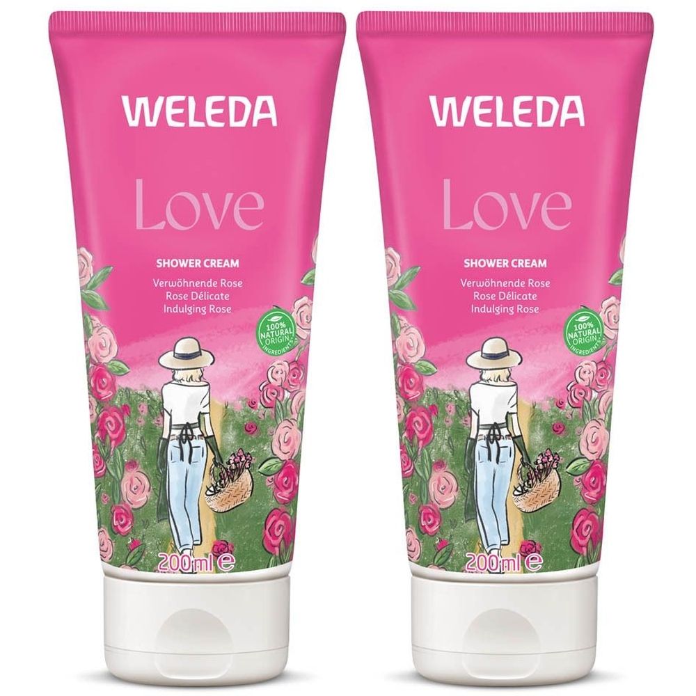 Deux tubes de crème de douche roses. Inscription "WELEDA Love". Illustration d'une femme avec un chapeau et des roses. 200ml.