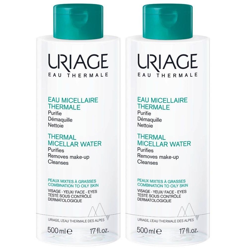 Twee witte flessen met groene doppen. Opschrift: Uriage Eau Thermale, Eau Micellaire Thermale. Tekst in het Frans en Engels.