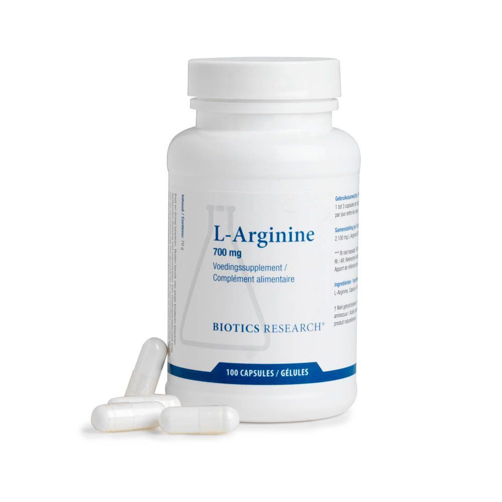 Een fles Biotics Research L-Arginine, 700 mg, 100 capsules, met drie capsules ernaast.
