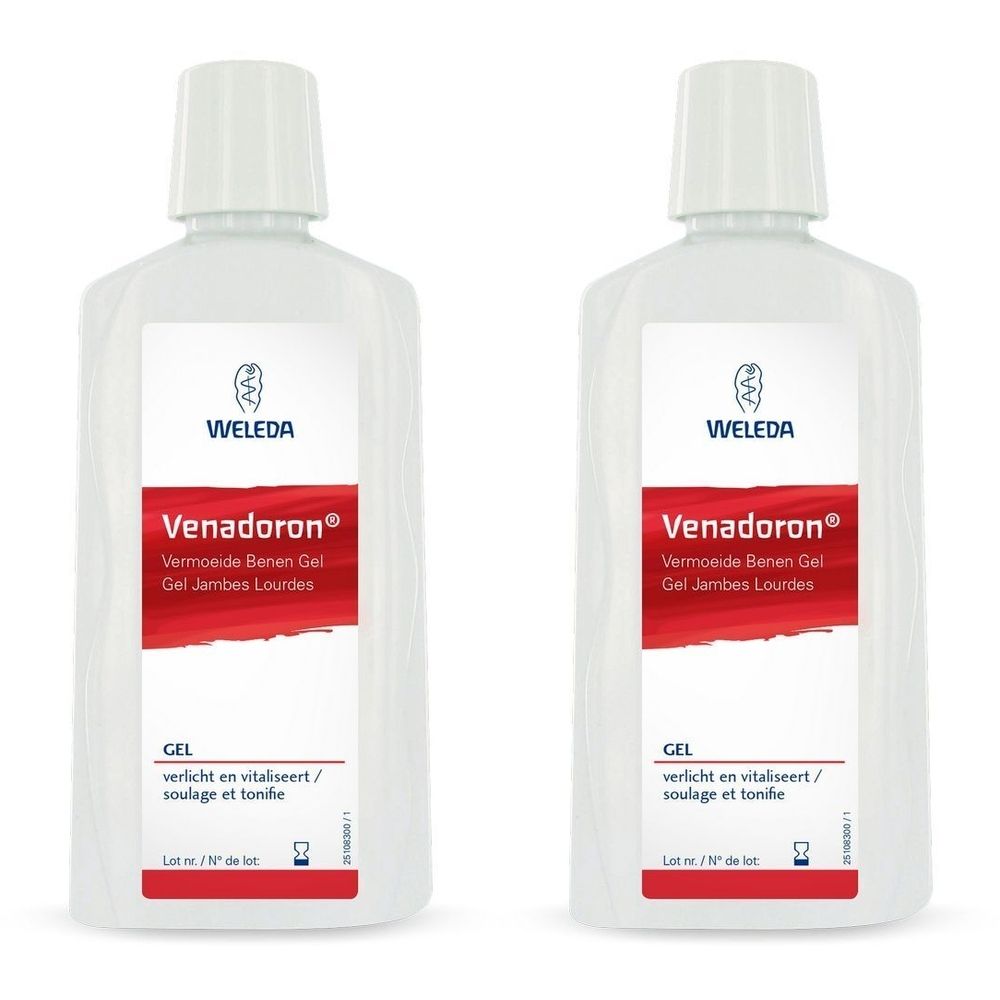 Deux flacons blancs avec étiquettes. Les étiquettes indiquent "WELEDA Venadoron Gel" en rouge. Les flacons ont des bouchons blancs.