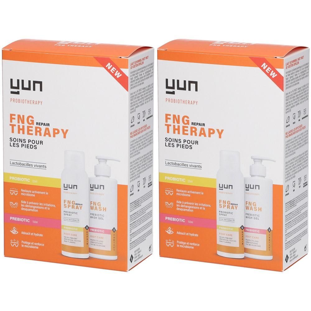 Twee dozen "YUN FNG Repair Therapy". Bevat flessen en sprays. Oranje en witte verpakking.