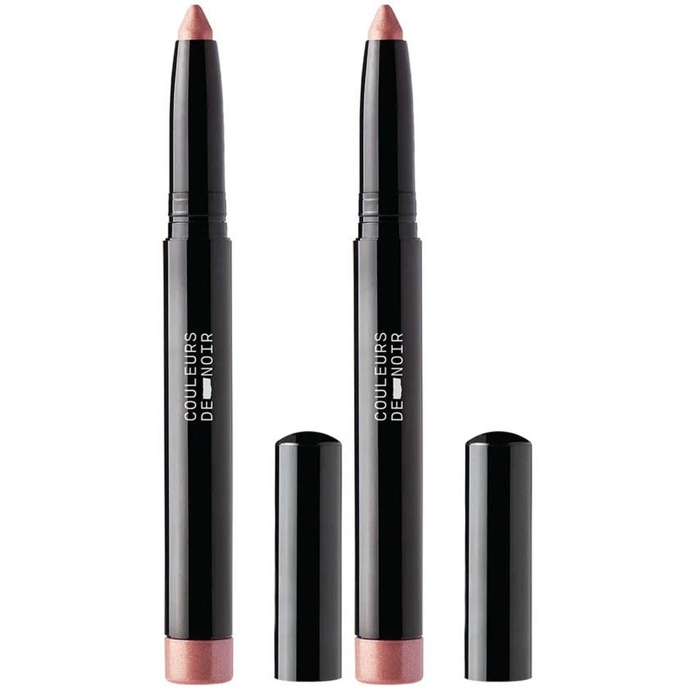 Deux sticks fard à paupières noirs avec pointes roses et capuchons noirs. "COULEURS DE NOIR" est inscrit sur les sticks.