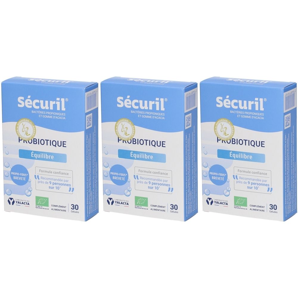 Trois boîtes de Yalacta Securil. Emballage bleu avec nom et logos. Inscription : Probiotique Équilibre, 30 unités.
