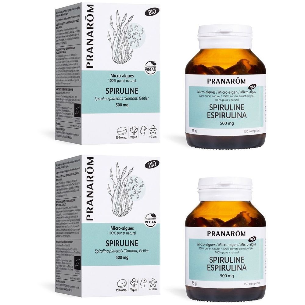 Twee dozen en twee flessen Spiruline. Opschrift: Pranarôm, Bio, Vegan. 500 mg.
