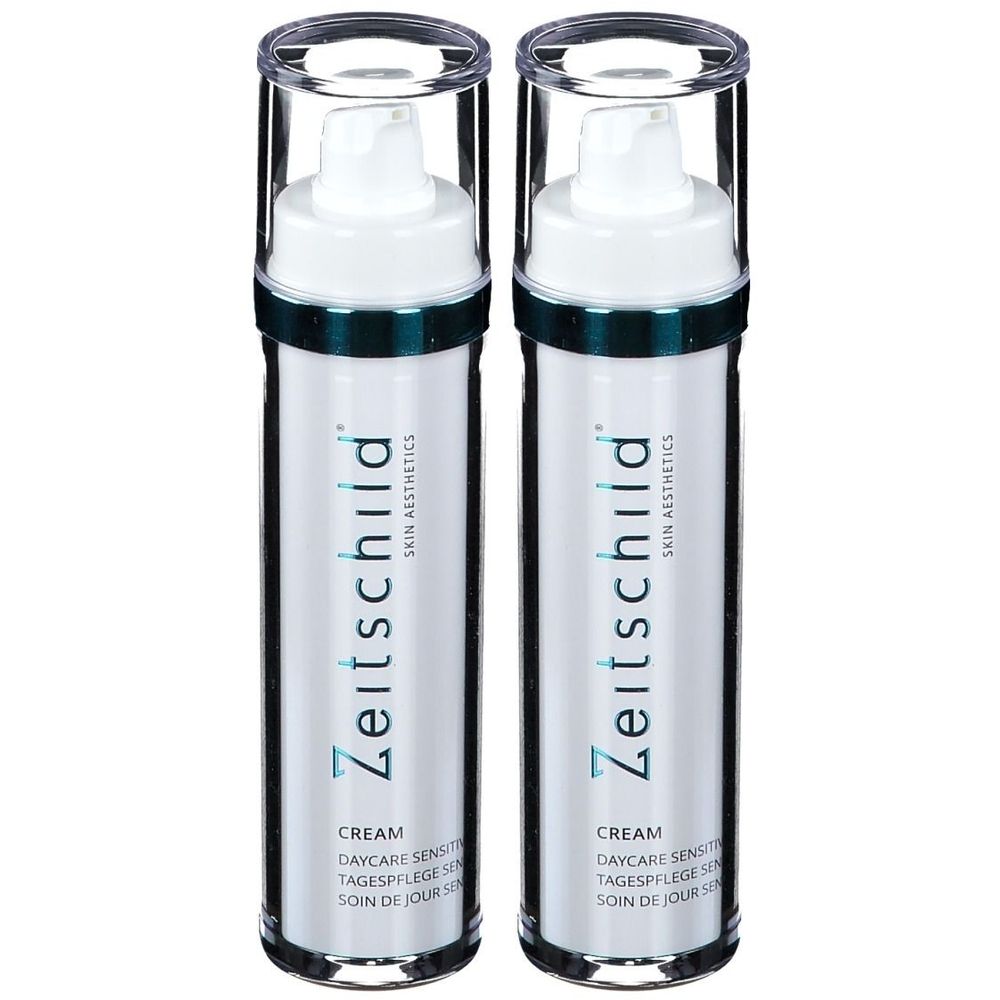 Deux flacons de Crème de Jour Peau Sensible Zeitschild Skin Aesthetics. Flacons blancs avec pompe et couvercle transparent. Texte: CREAM, DAYCARE SENSITIVE.