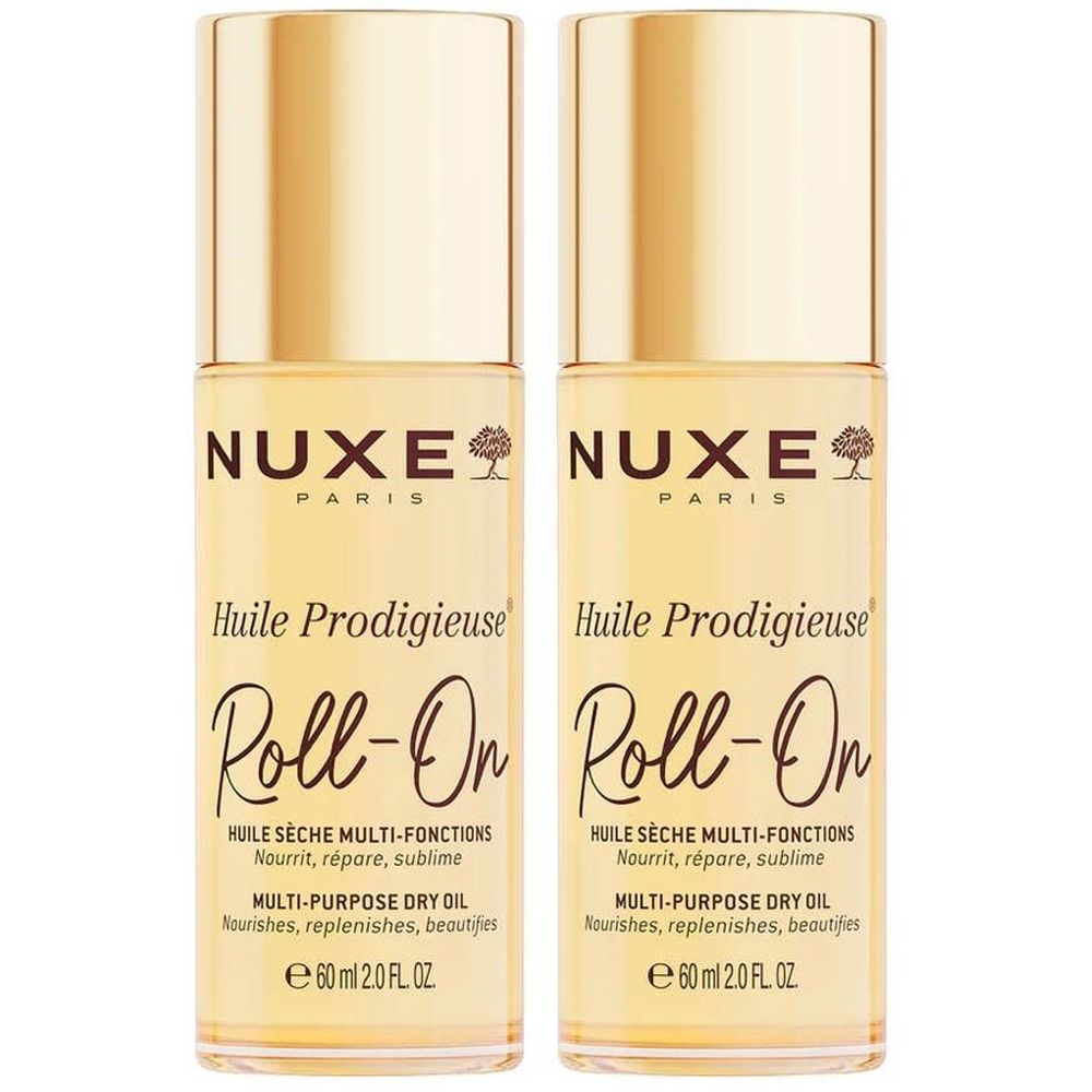 Twee flessen Nuxe Huile Prodigieuse Roll-On. Gouden doppen, transparante flessen met gelige vloeistof. Tekst: Nuxe, Huile Prodigieuse, Roll-On.
