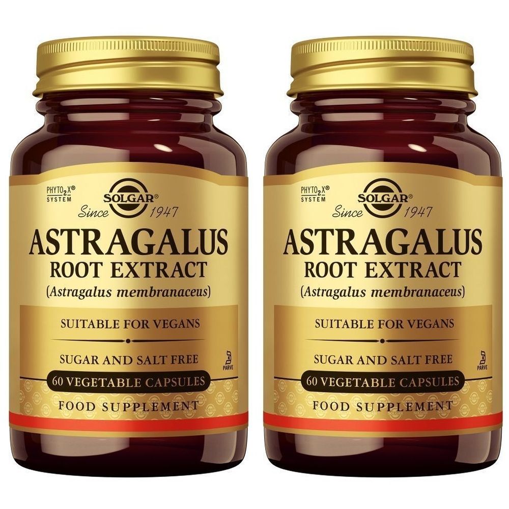 Deux flacons de Solgar Astragalus Root Extract. Flacons en verre brun avec bouchons et étiquettes dorés. Inscription : Astragalus, Root Extract.