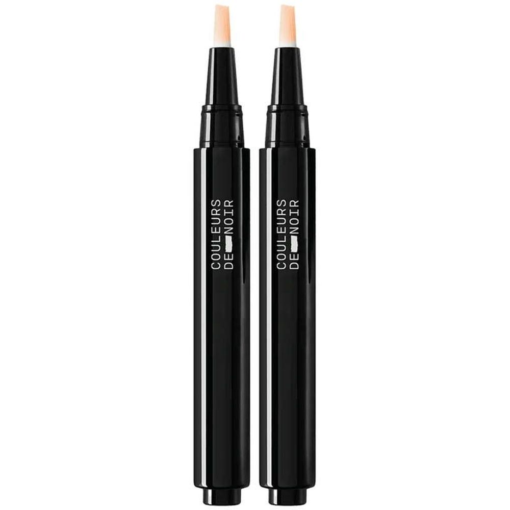 Deux stylos noirs avec pointes beige clair. Le texte "COULEURS DE NOIR" est visible.