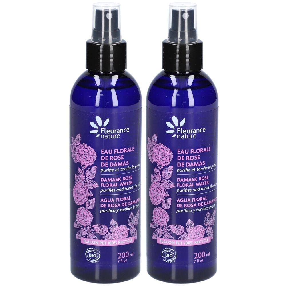 Twee blauwe spuitflessen met etiketten. Opschrift: Eau Florale de Rose de Damas. Met Bio-label. 200 ml.