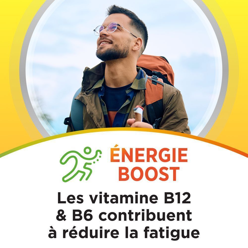 Homme avec sac à dos. Texte: Énergie Boost. Les vitamines B12 & B6 contribuent à réduire la fatigue.