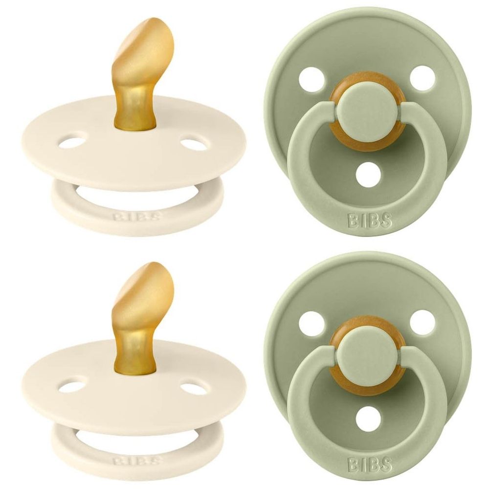 Vier fopspenen in ivoor en salie. Ronde vorm met speen en ring. BIBS-logo op de ring.