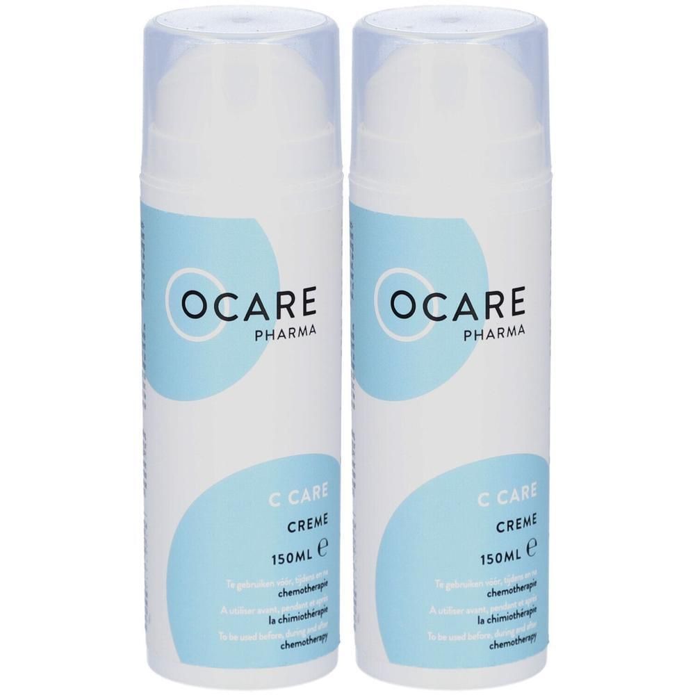 Twee flessen OCARE PHARMA C Care crème. Witte flessen met blauw etiket. Tekst: C Care Creme, 150ml.