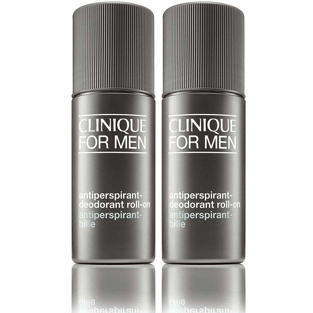 Deux déodorants roll-on gris. Inscription: CLINIQUE FOR MEN, anti-transpirant déodorant roll-on.