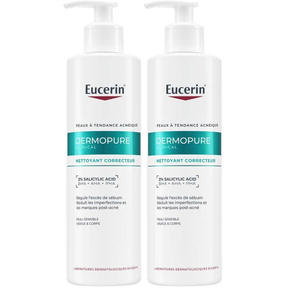 Deux flacons Eucerin DERMOPURE CLINICAL Nettoyant Correcteur. Flacons blancs avec pompe, texte vert.