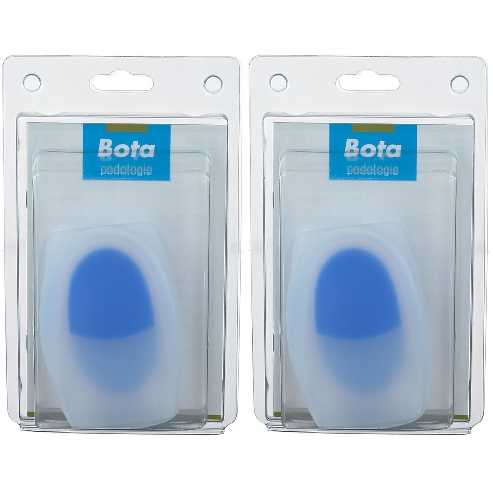 Deux blisters transparents contenant des coussins de talon. Inscription "Bota podologie". Coussinets bleus et transparents.