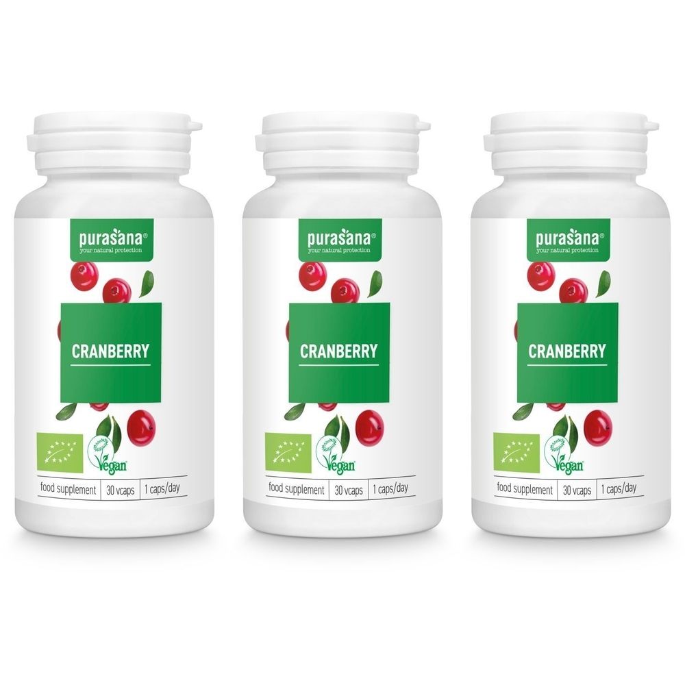 Drie witte flessen met het label "Cranberry". Het label toont cranberry-illustraties, het logo en de tekst "Vegan".