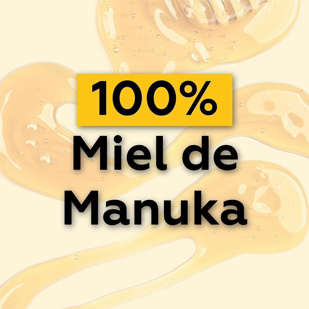 Miel sur fond clair. Texte : 100% Miel de Manuka.