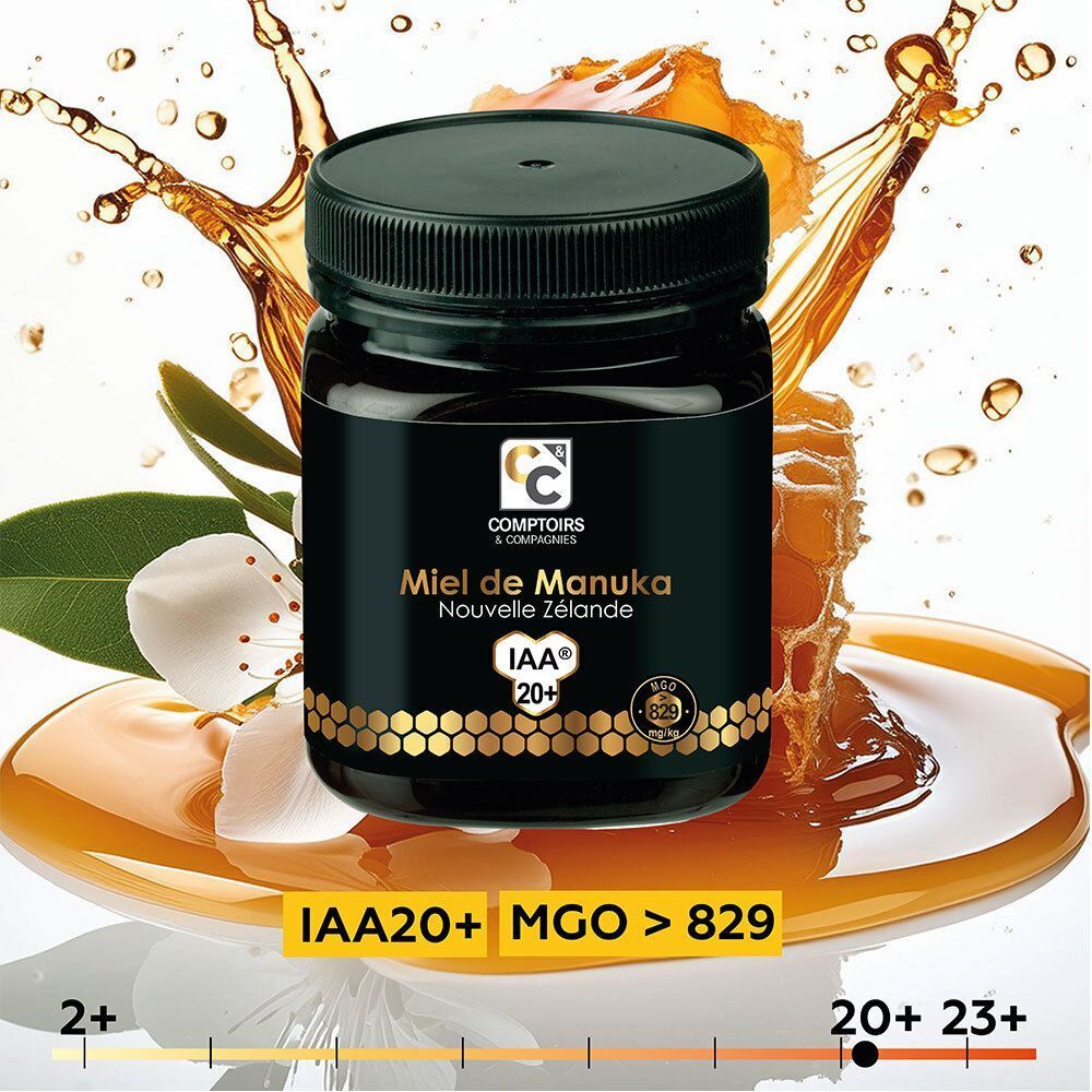 Pot de Miel de Manuka IAA 20+ avec miel et fleurs. IAA20+ MGO > 829. Étiquettes et couvercles dorés.